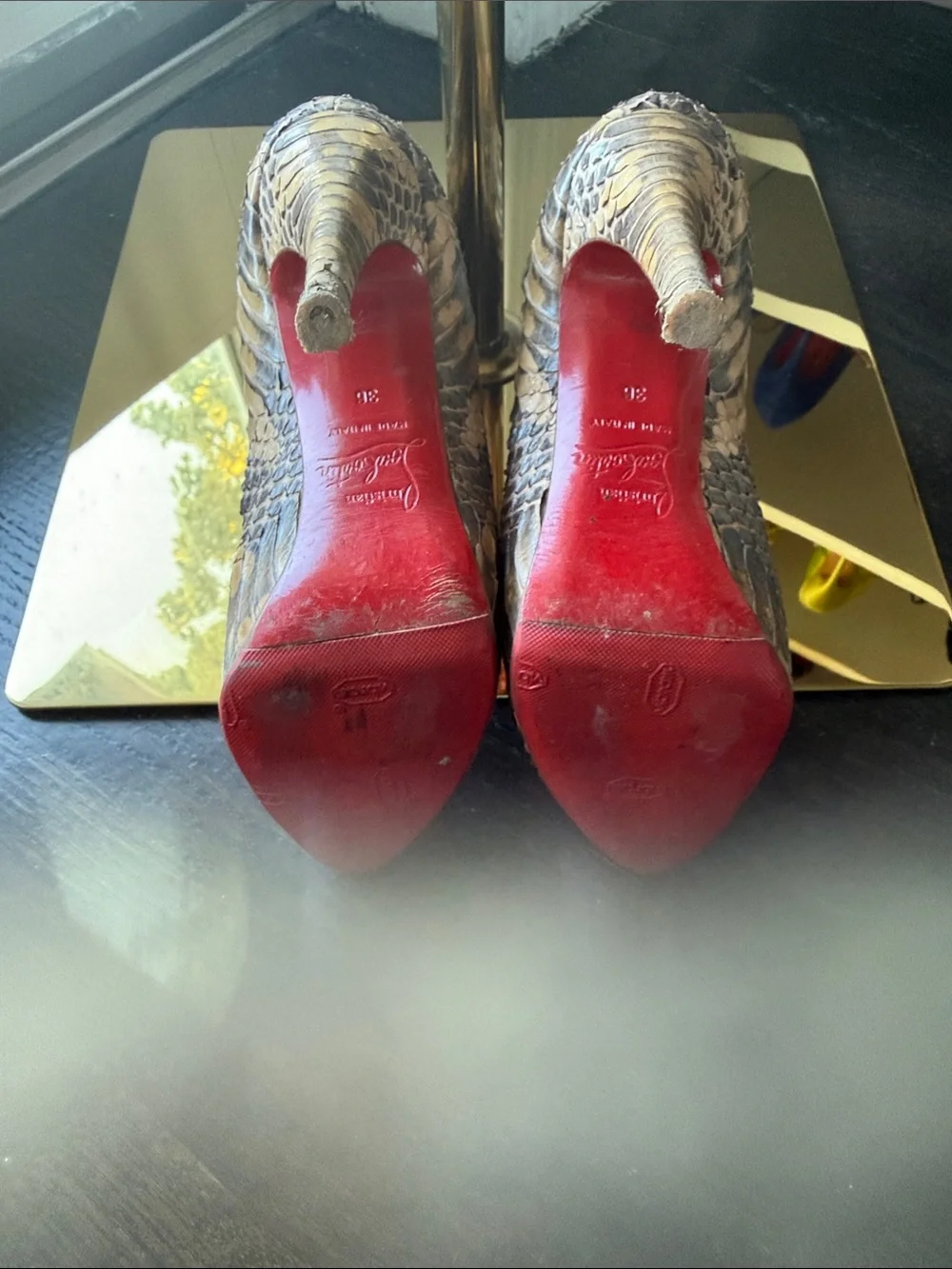 Christian Louboutin python skin bootie